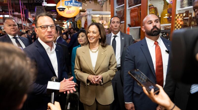 Vice President Kamala Harris (center) and Pennsylvania Gov. Josh Shapiro (left)