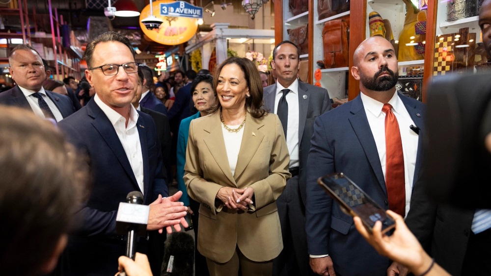 Vice President Kamala Harris (center) and Pennsylvania Gov. Josh Shapiro (left)