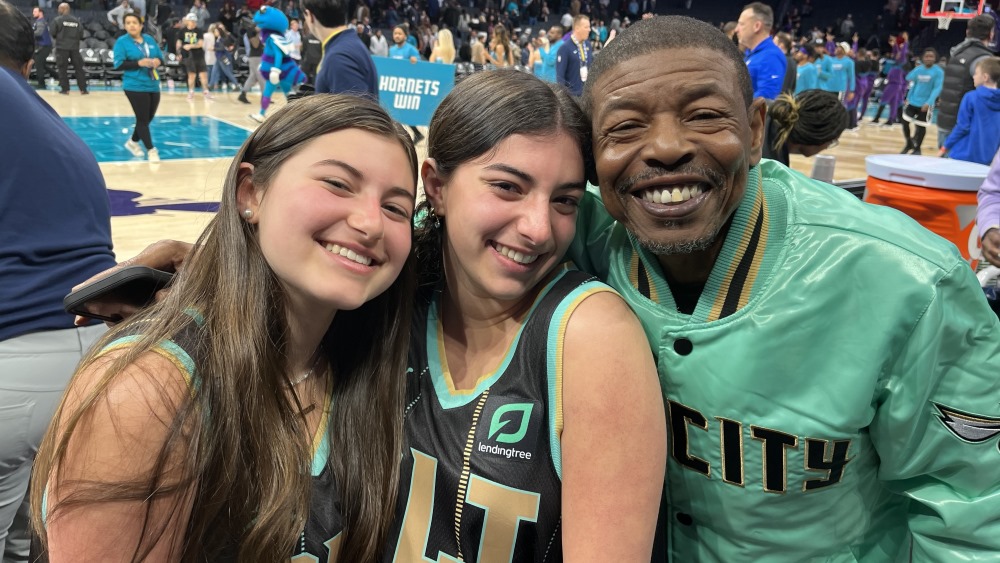 Sophie and Emma Zirkin with Muggsy Bogues