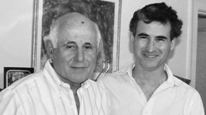 Eric K. Reisman, shown here with his father Bernard in 2001