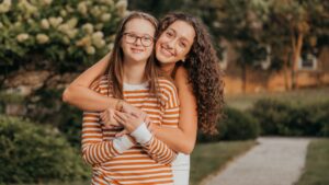 Ava K. Perlin with her younger sister, Millie
