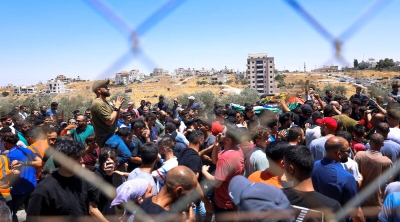 mourners in the West Bank
