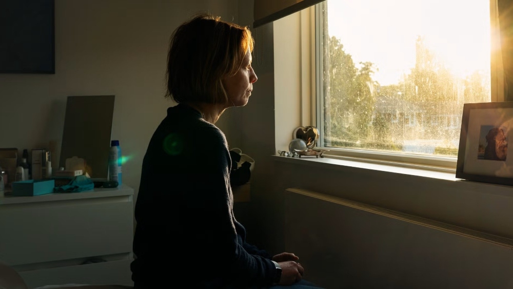 woman at window